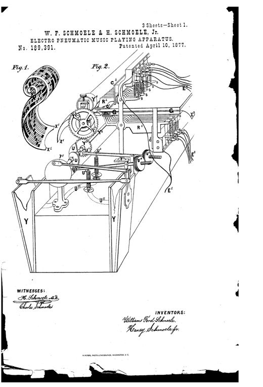 An 1877 patent drawing showing a large coiled, printed music sheet feeding through a slotted guide into an angled reading apparatus with metal comb-mounted spring 'reader' fingers, gears, rollers, and multiple insulated wires leading off to electromagnetic actions housed in a wooden cabinet frame.