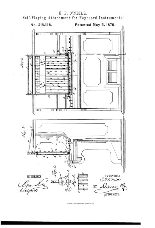 Patent drawing of an upright organ or piano with an overhead frame holding a paper music-chart between two rollers, gears, and rows of pivoted false keys positioned above the instrument's keyboard.