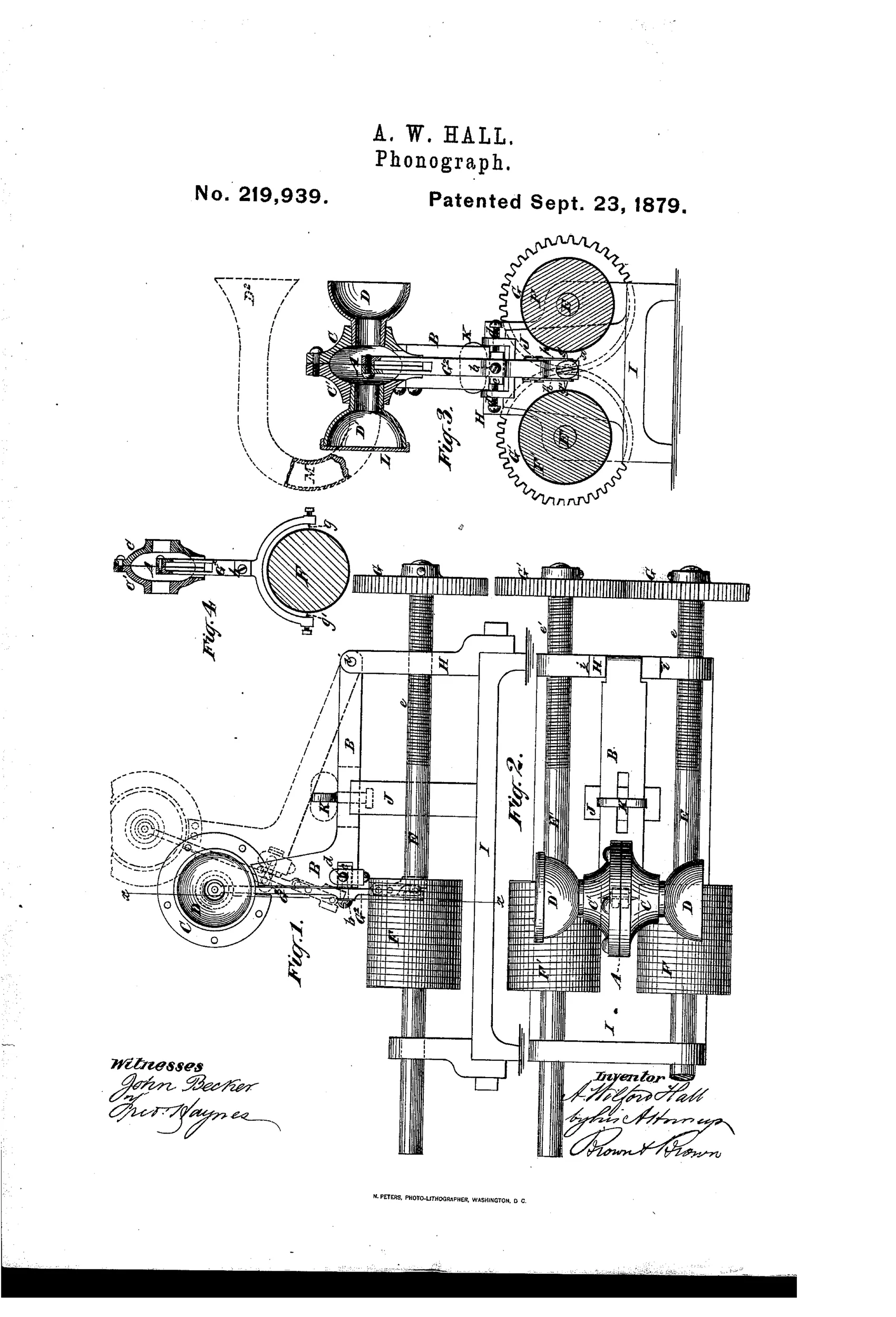 Patent drawing of a tin-foil cylinder phonograph showing two geared cylinders, a central diaphragm with dual mouth-pieces and tubes, and a forked lever with recording points, alongside a side elevation of the full mechanism on its base.