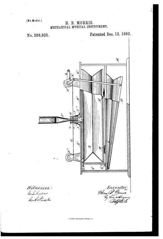 A side-elevation patent drawing showing the internal mechanism of an automatic reed organ, with a bellows, reservoir bellows, reed pipes arranged in a fan pattern, a wound paper valve-sheet running over two rollers, and a hand-crank mechanism at top left.