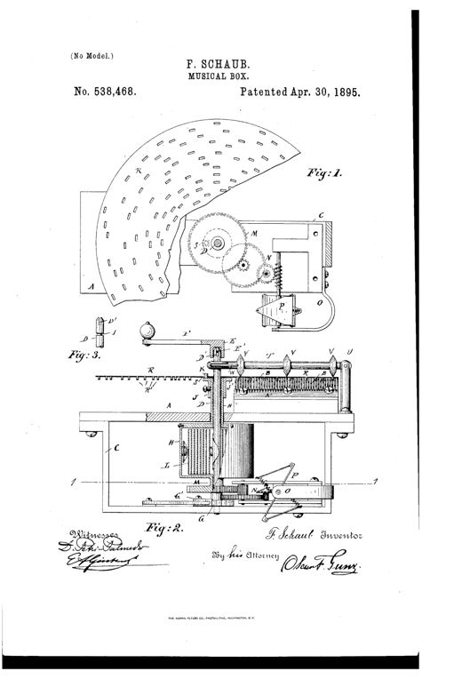 Patent drawing of a disc musical box mechanism showing a large perforated note disc, gear train, spring drum, governor fan, and comb assembly with labeled parts A through W.